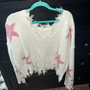 STORIA sweater, size medium cream, color with pink stars lightly used